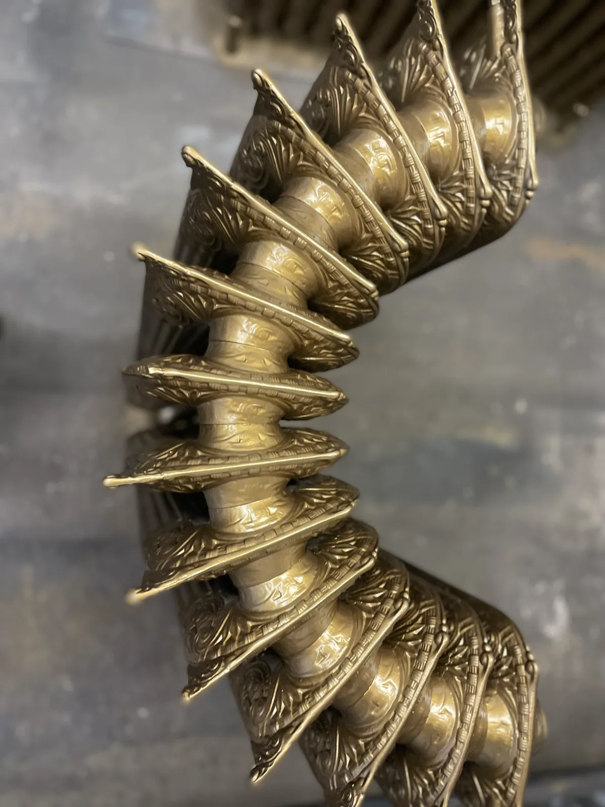 Circular cast iron radiator from the Municipal Hotel Liverpool mid-restoration at the Radrestore workshop